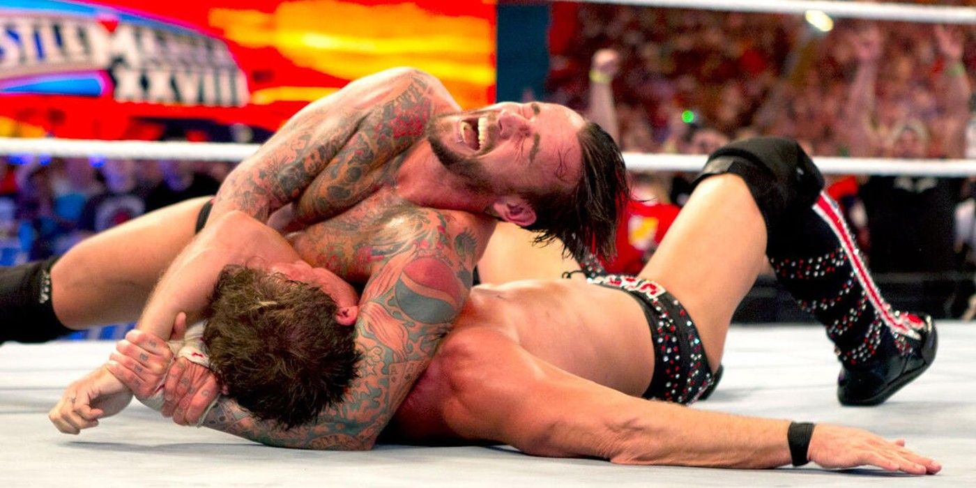 CM Punk bloquea el Anaconda Vise sobre Chris Jericho en WWE WrestleMania 28