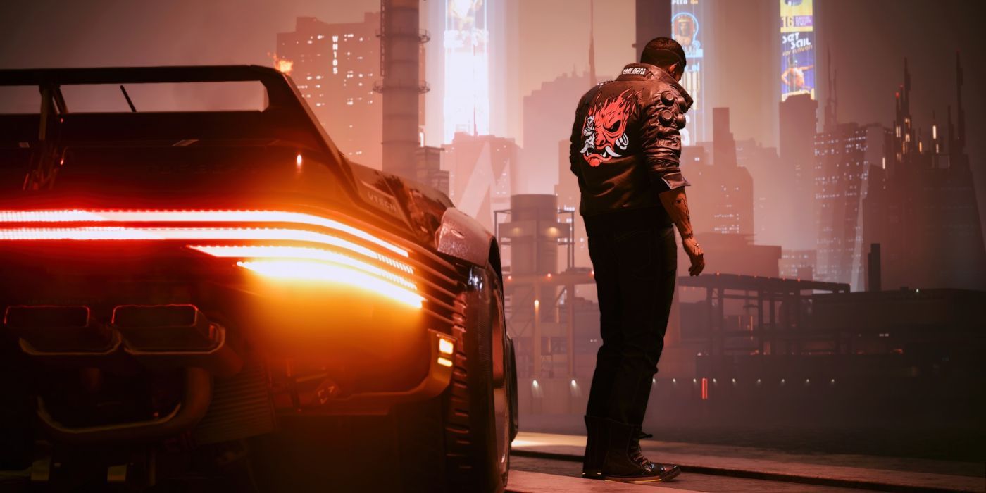 V in Cyberpunk 2077 standing alongside his car while Night City stretches before him