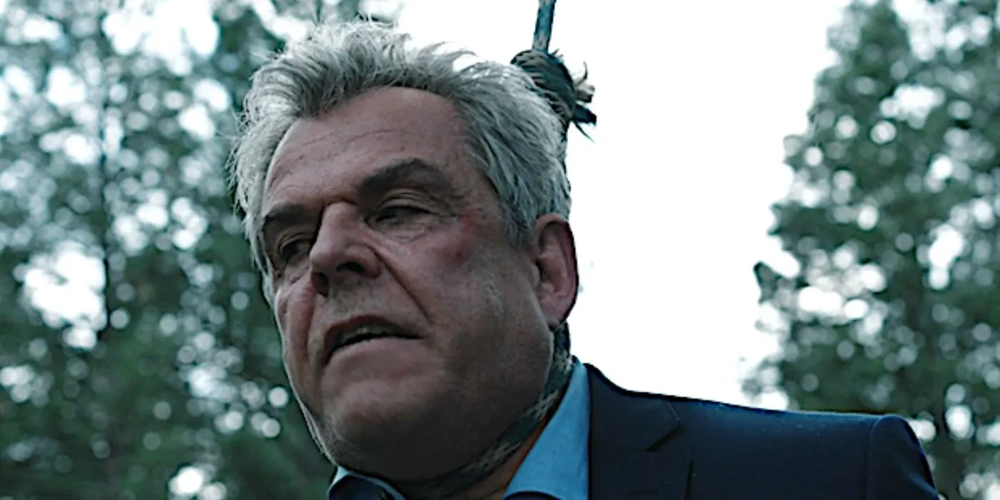 Dan Jenkins (Danny Huston) hanging from a rope in Yellowstone. copy