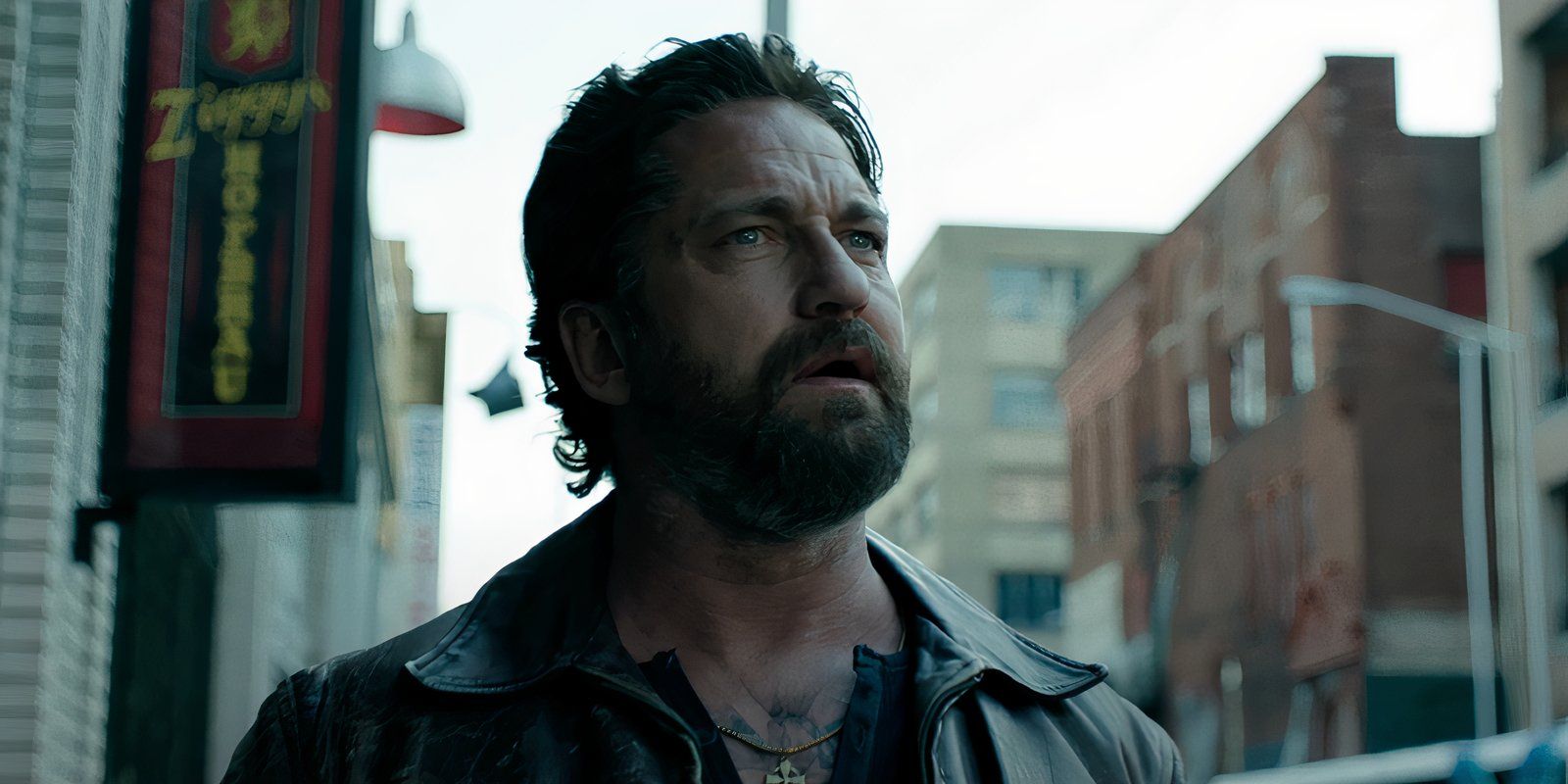 Gerard Butler looking shocked as Big Nick in Den of Thieves 2 Pantera