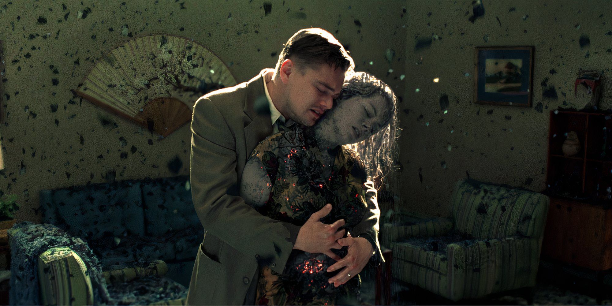 Dolores (Michelle Williams) turns to ash in Teddy's (Leonardo DiCaprio) arms in Shutter Island