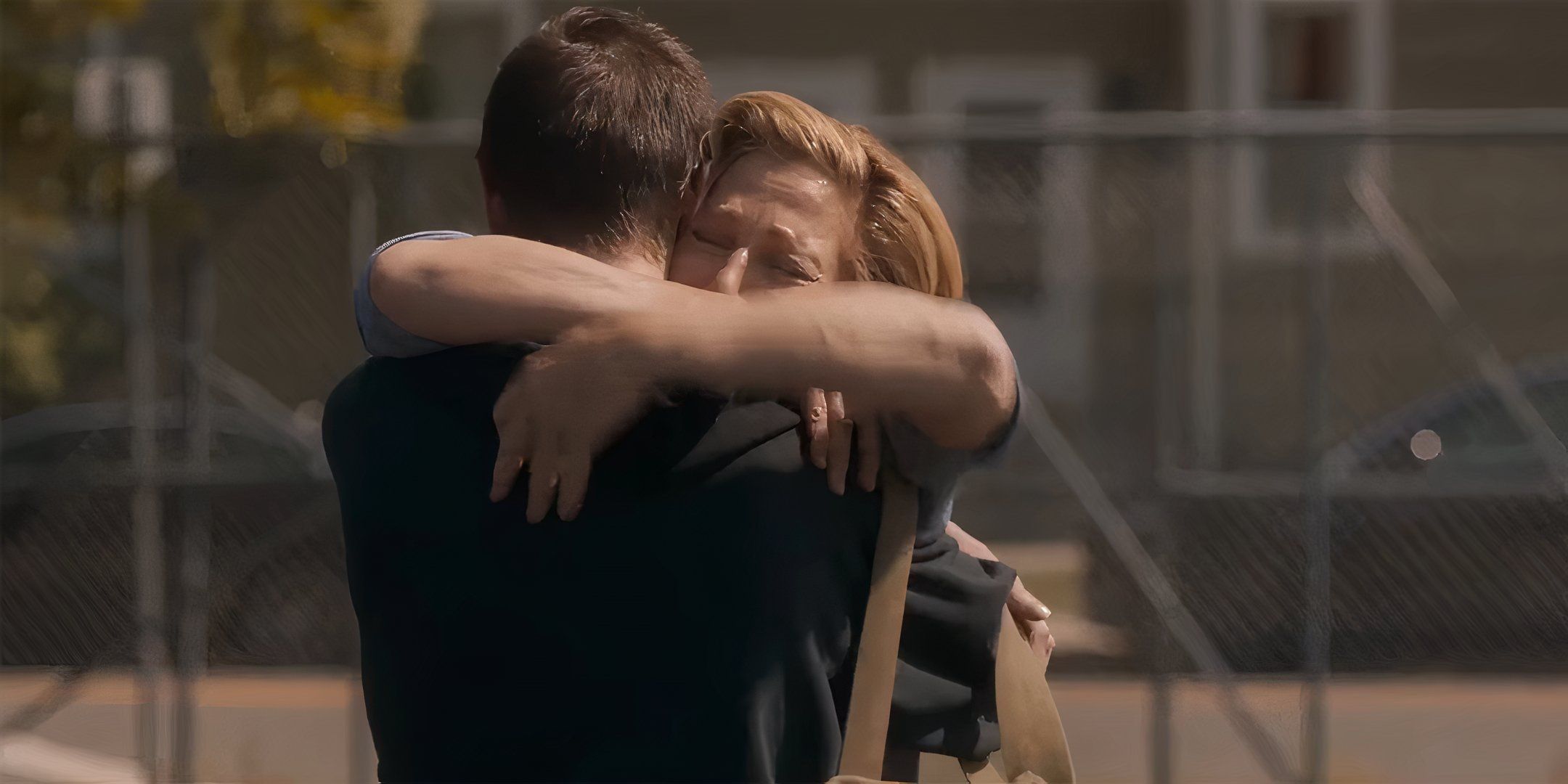 Edie Falco as Wanda crying while hugging Charlie Tahan's Mark in I'll Be Right There