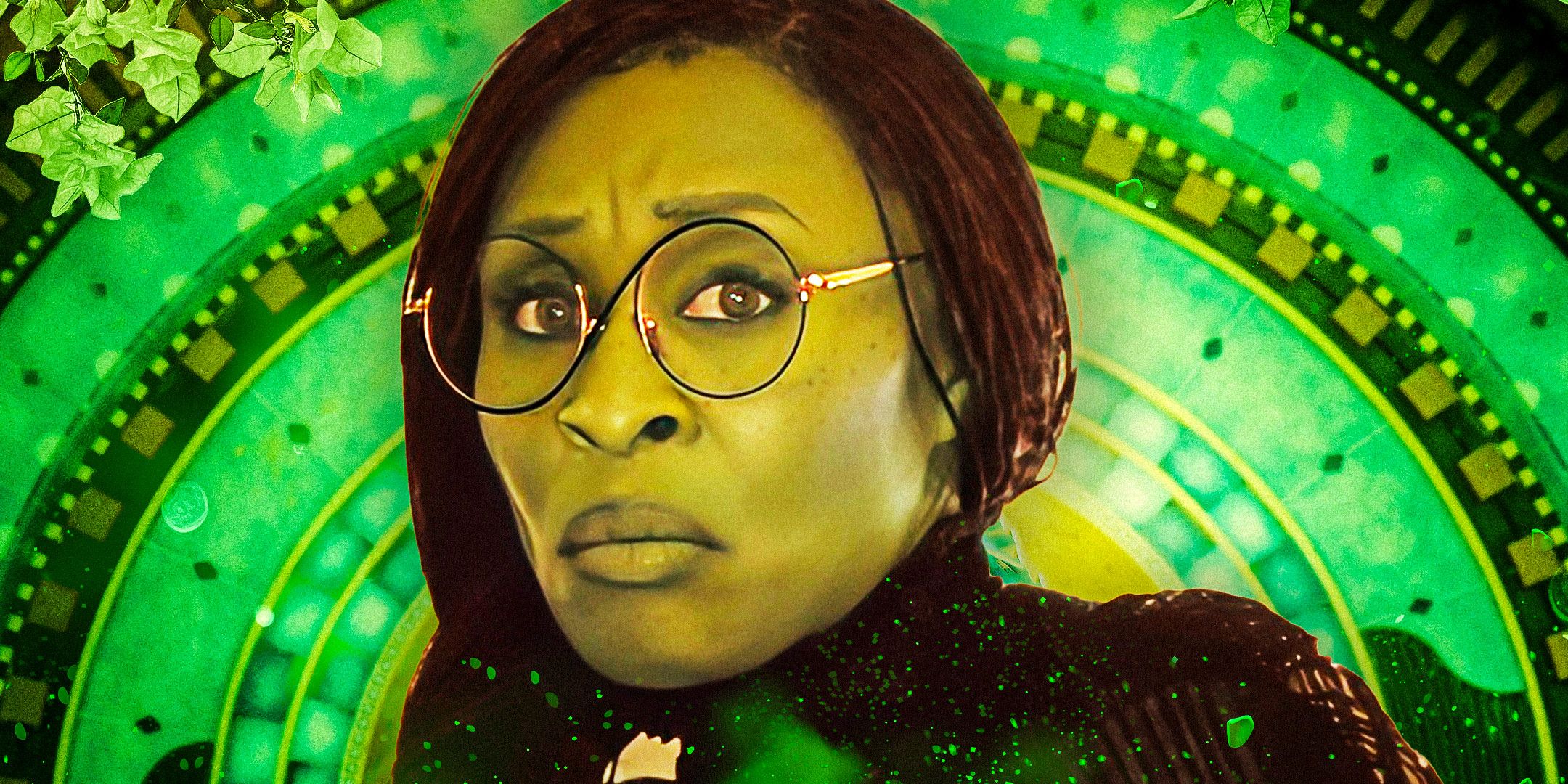 Elphaba (Cynthia Erivo) wearing glasses and looking concerned with a green clock behind her in the Wicked movie