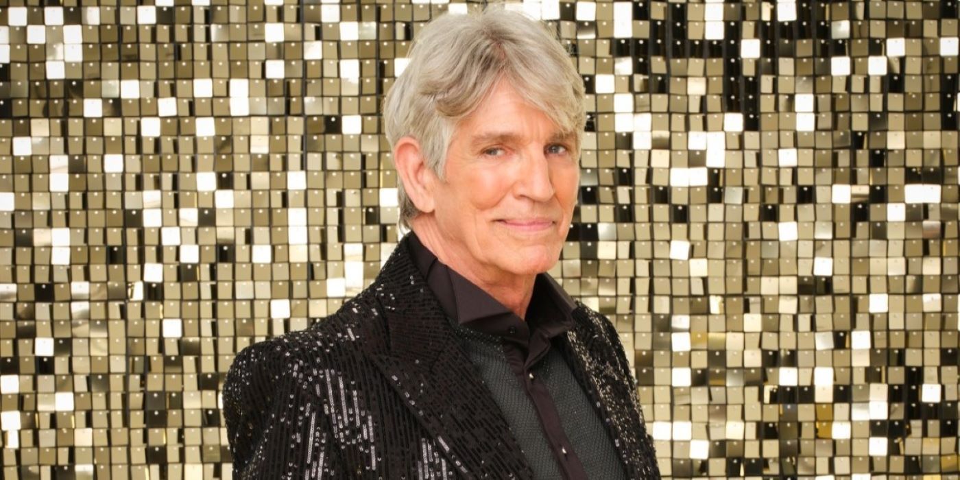 Eric Roberts on Dancing with the Stars smiling in a black sparkly suit