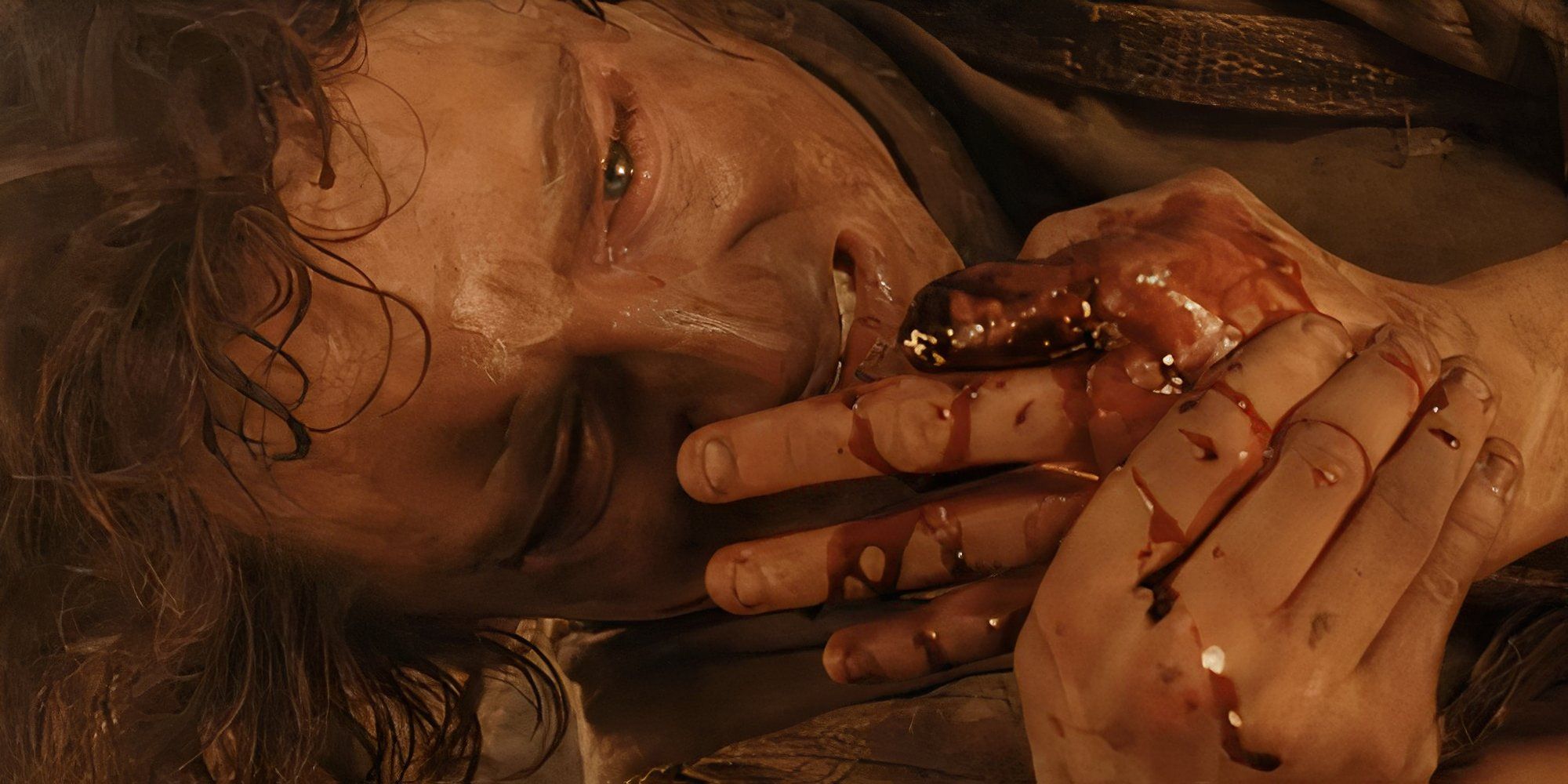 Frodo looking at his severed finger in Rings of Power