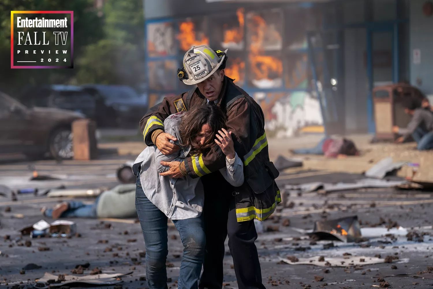 Chief Pascal rescuing someone from an explosion in Chicago Fire season 13