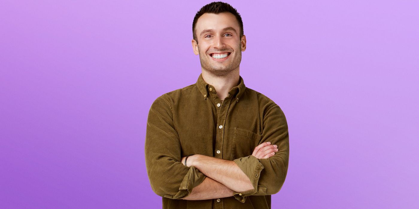 Love Is Blind season 7 Garrett Josemans with his arms folded during promo shot