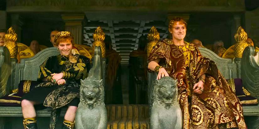 Fred Hechinger as Emperor Caracalla and Joseph Quinn as Emperor Geta enjoying a show at the Colosseum in Gladiator II