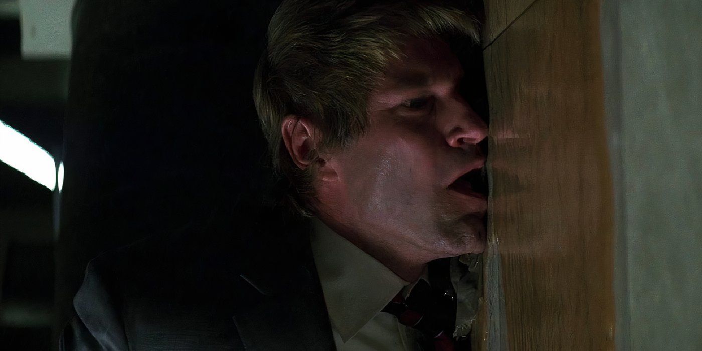 Harvey Dent face down in gasoline in The Dark Knight