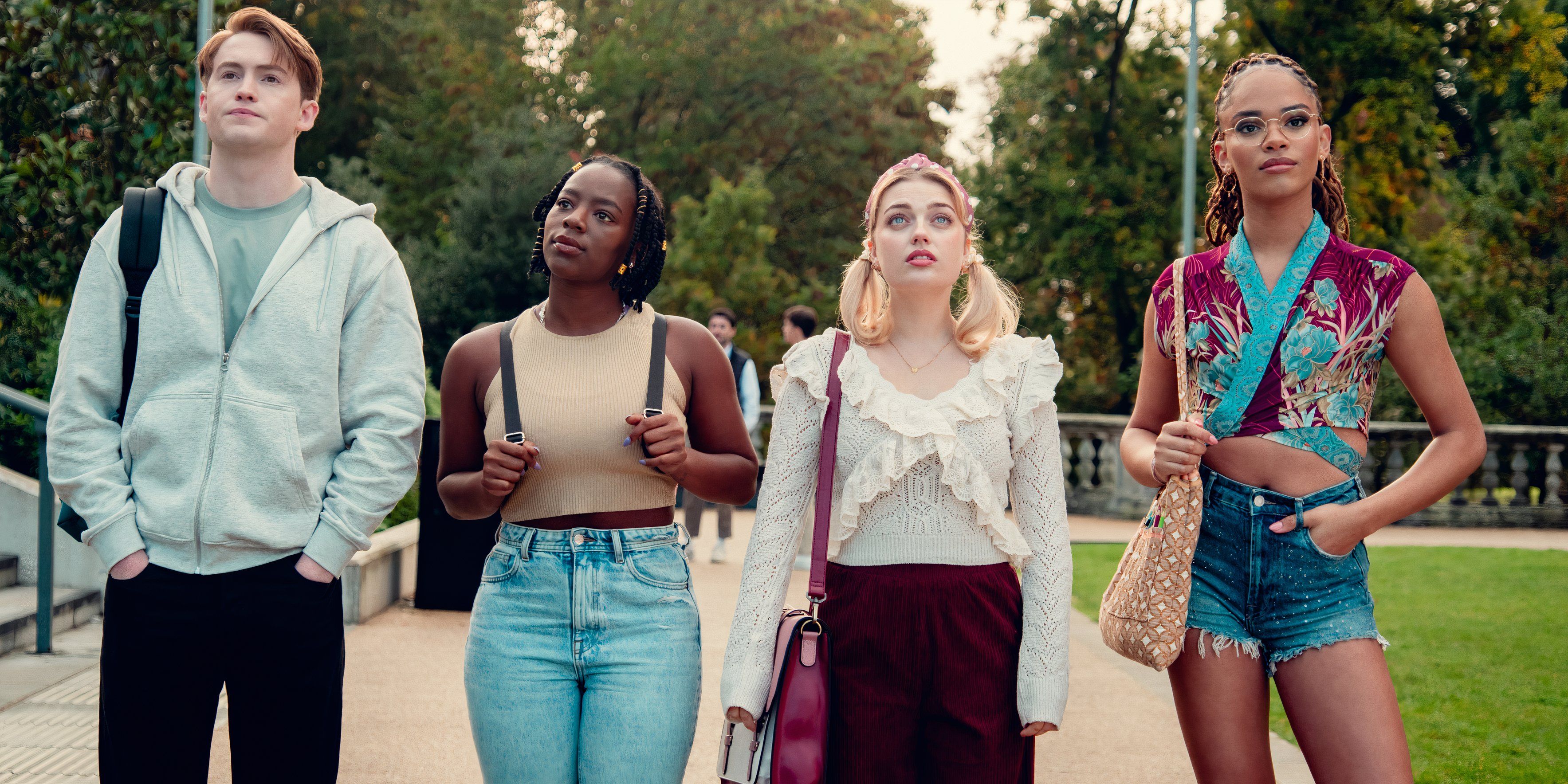 Heartstopper's Nick (Kit Connor), Tara (Corrina Brown), Imogen (Rhea Norwood), and Elle (Yasmin Finney) stand in the middle of a sidewalk in season 3