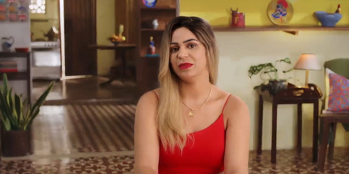 Ingrid in 90 Day Fiance in red dress during confessional