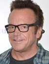 Headshot Of Tom Arnold