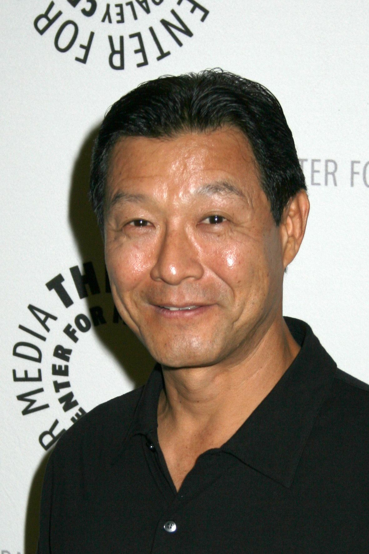 Headshot Of James Saito
