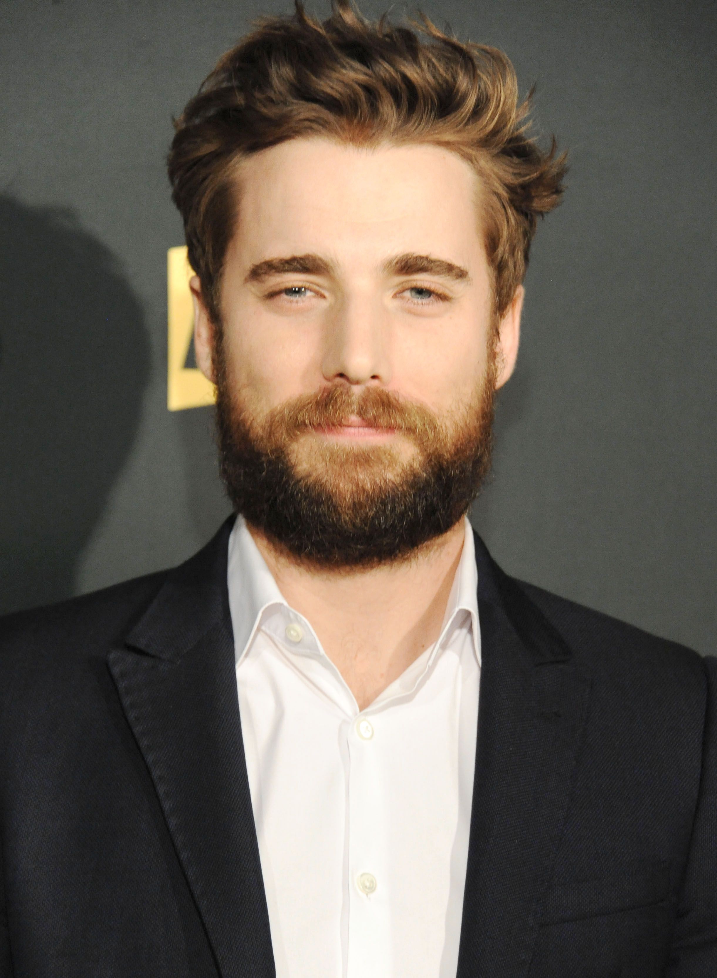 Headshot Of Dustin Milligan