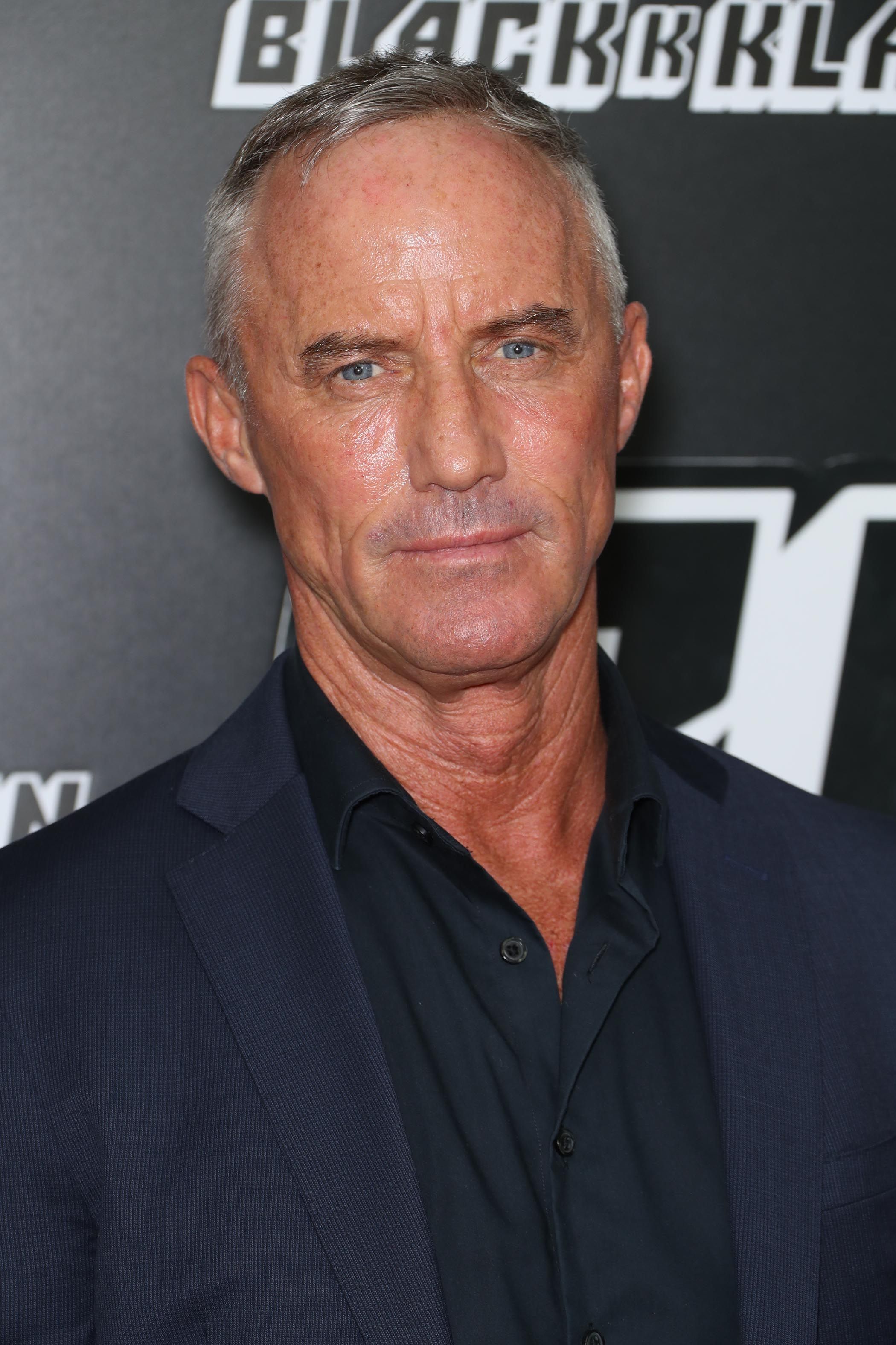 Headshot of Robert John Burke