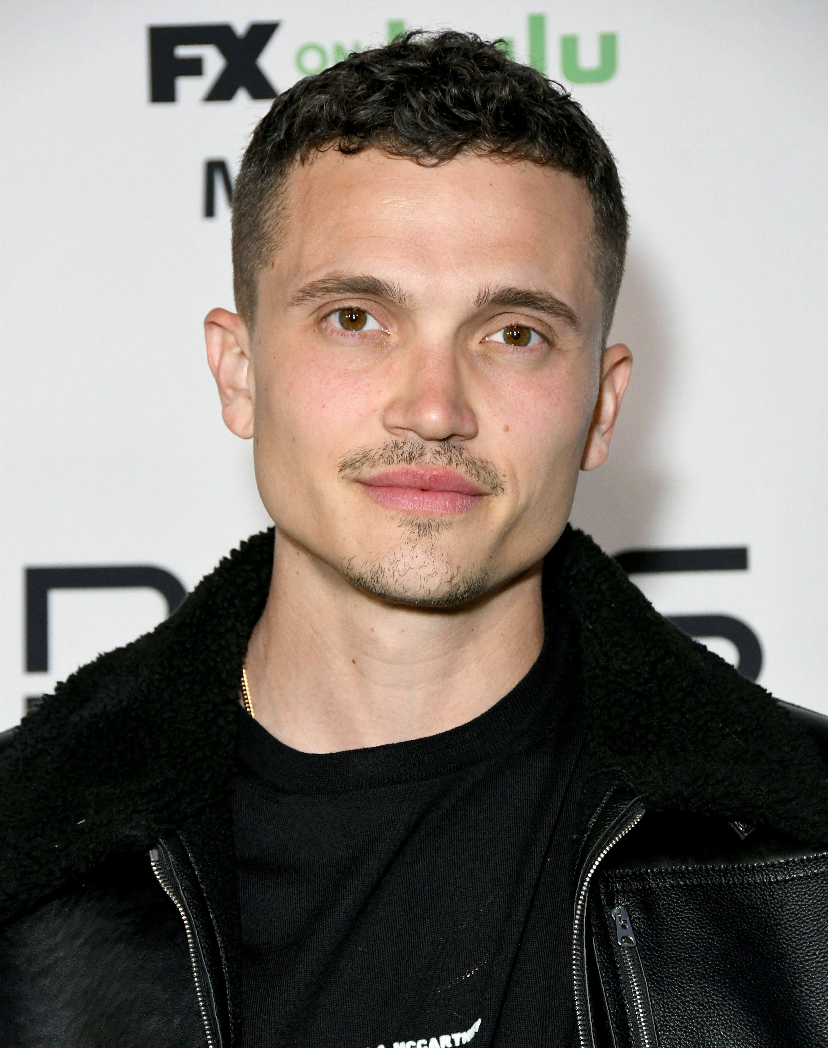 Headshot Of Karl Glusman