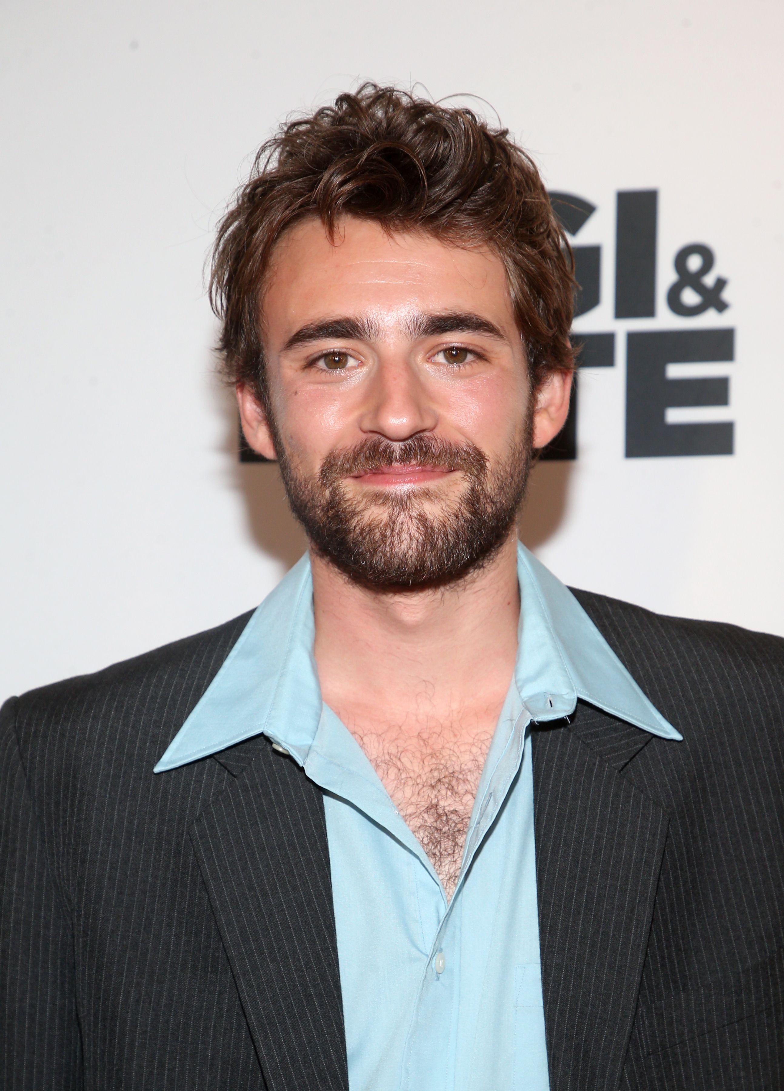 Headshot Of Charlie Rowe