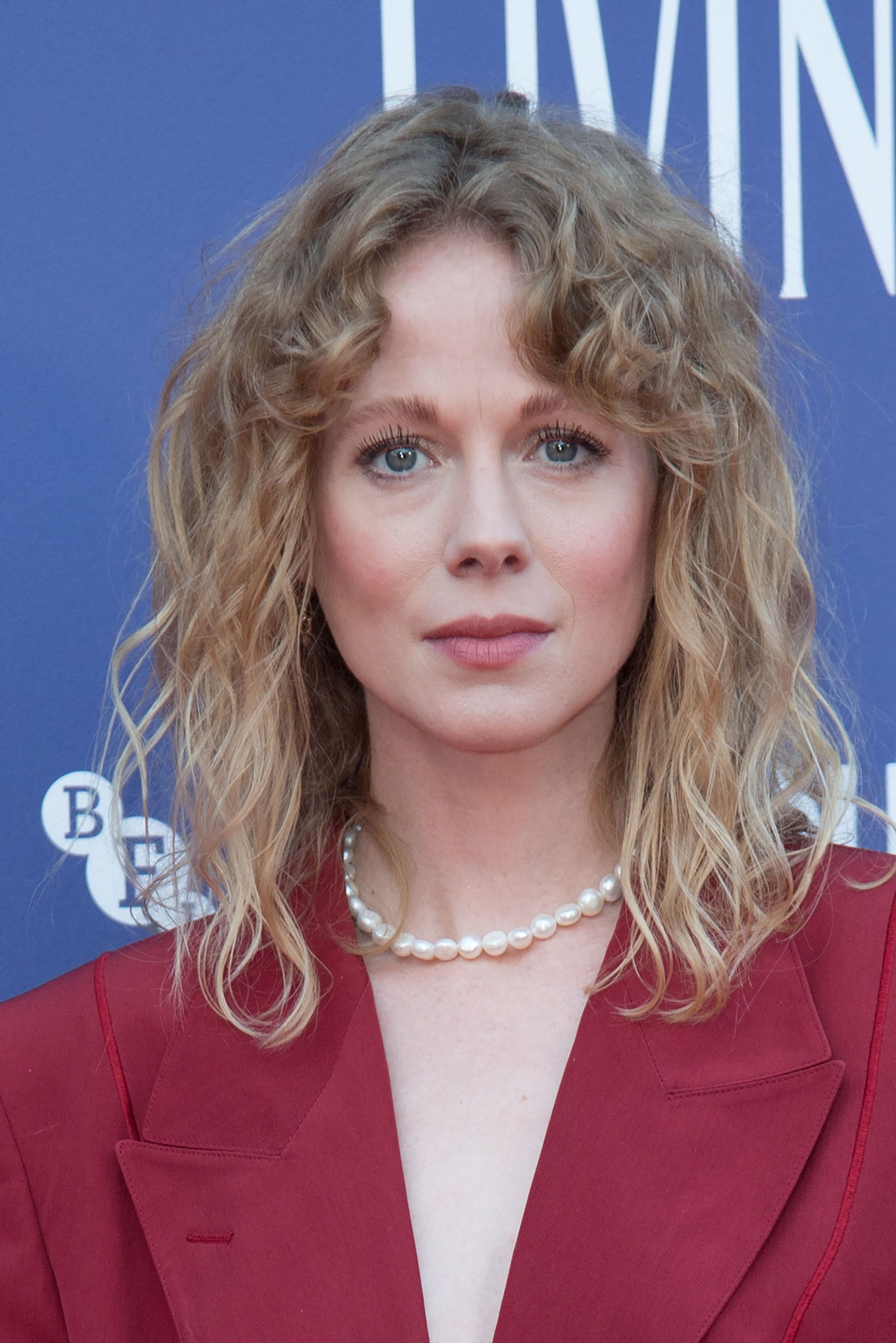 Headshot Of Zoe Boyle