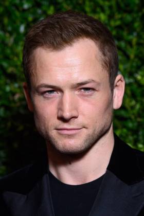 Headshot Of Taron Egerton