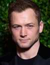 Headshot Of Taron Egerton