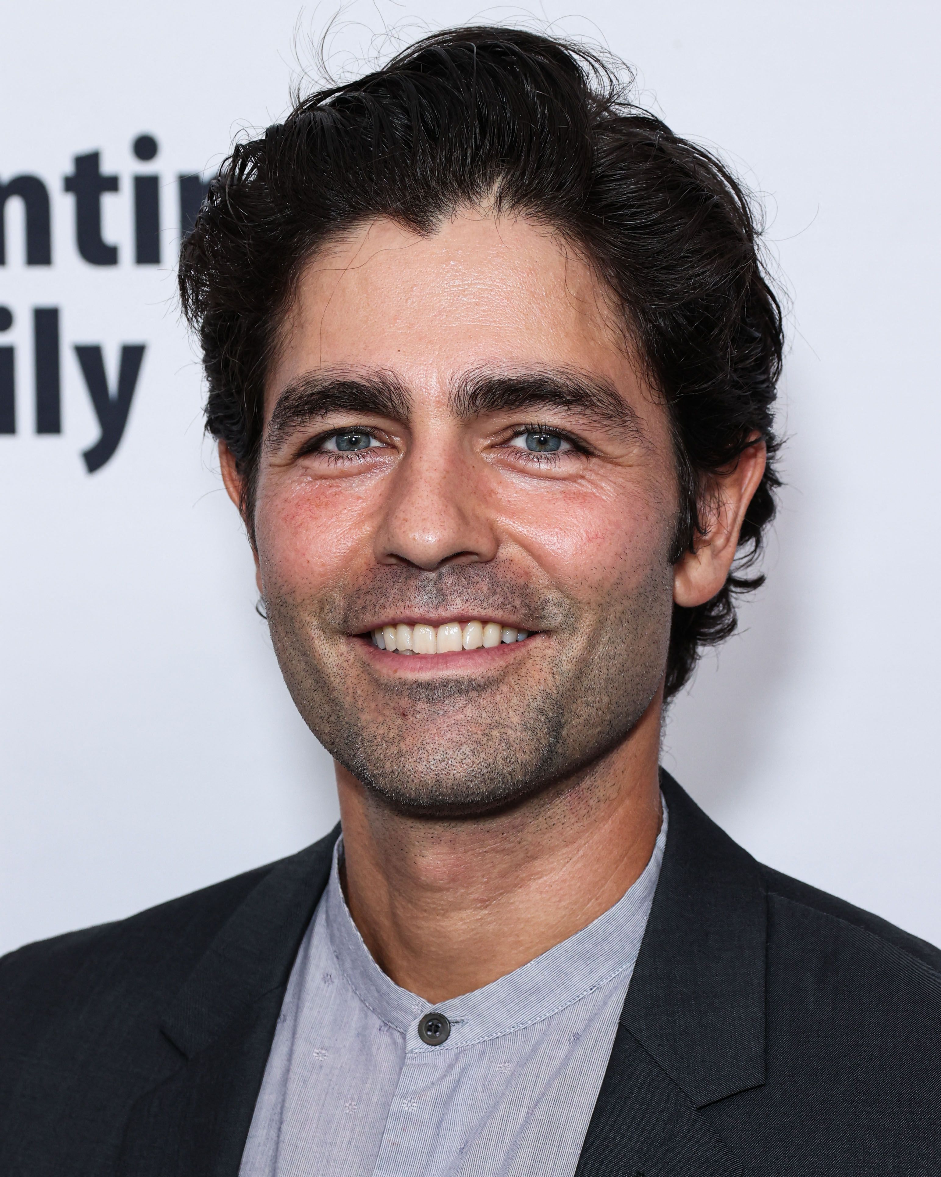 Headshot of Adrian Grenier