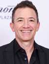 Headshot of David Faustino