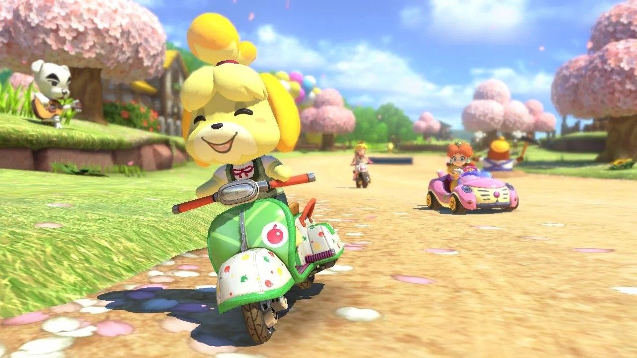 Isabelle driving a scooter in Mario Kart 8.