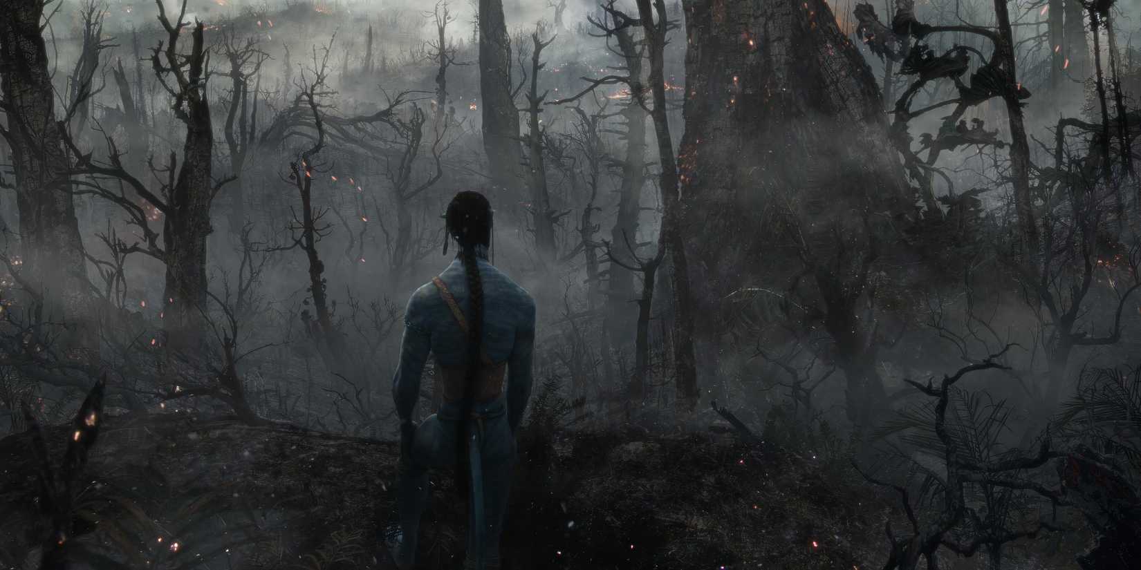 Jake Sully stands in home tree's destruction