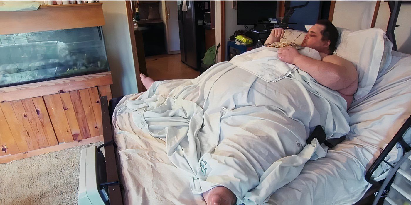 James King from my 600-lb life in bed in the hospital covered in a white sheet