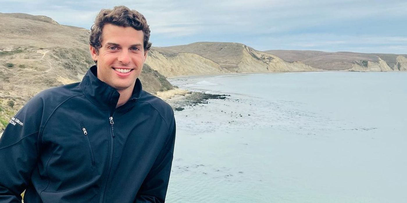 Love Is Blind season 7 Jason Drecchio smiling with water and mountains visible in the background