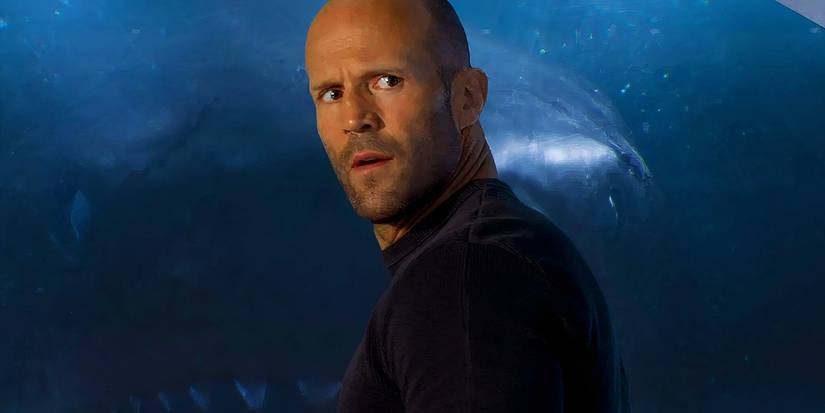 Jason Statham as Jonas Taylor looking over his shoulder with worry in The Meg