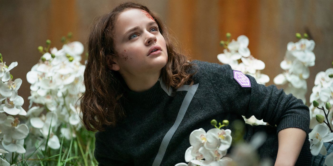 Joey King como Tally dormindo no jardim de orquídeas Uglies