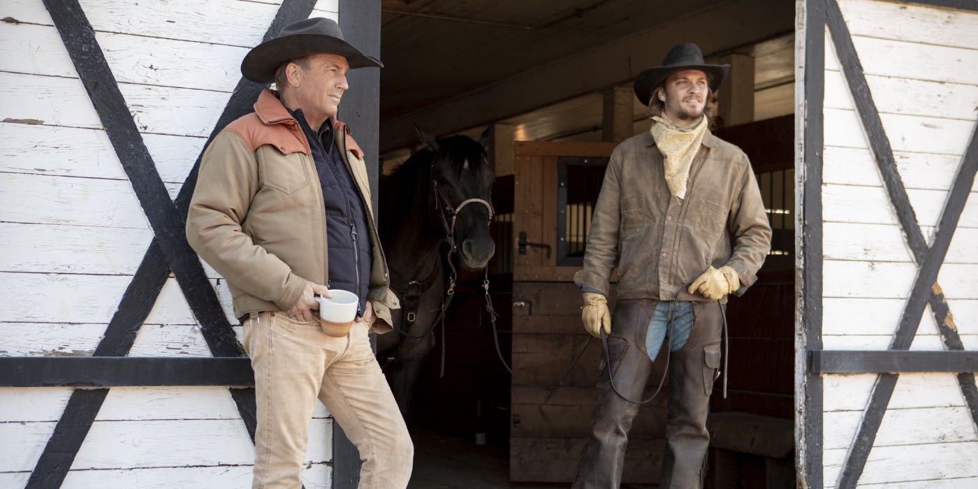 John (Kevin Costner) and Kayce (Luke Grimes) standing outside a barn in Yellowstone