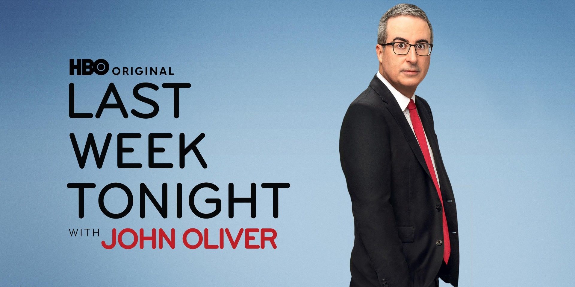 John Oliver standing sideways on a promotional image for Last Week Tonight with John Oliver