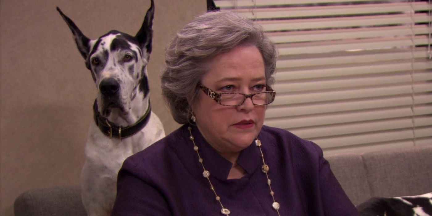 Kathy Bates with her dog in sat down in The Office