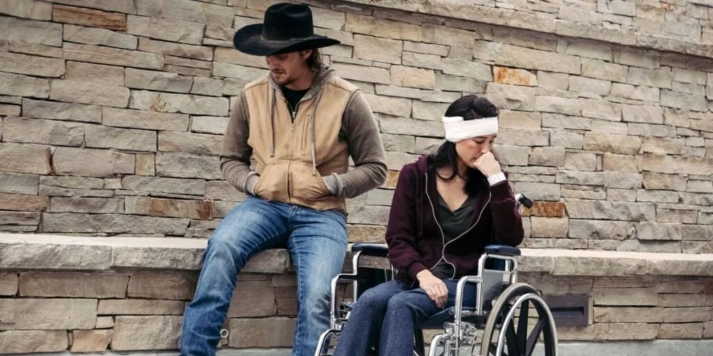 Kayce (Luke Grimes) and Monica (Kelsey Asbille) having a fight while Monica is in a wheelchair in Yellowstone. copy