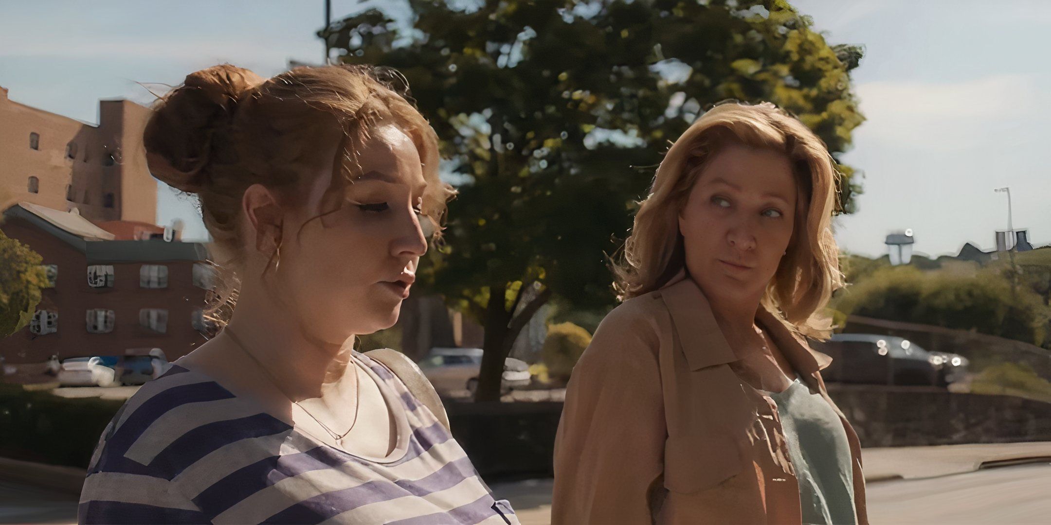 Kayli Carter as Sarah walking next to Edie Falco's Wanda in I'll Be Right There