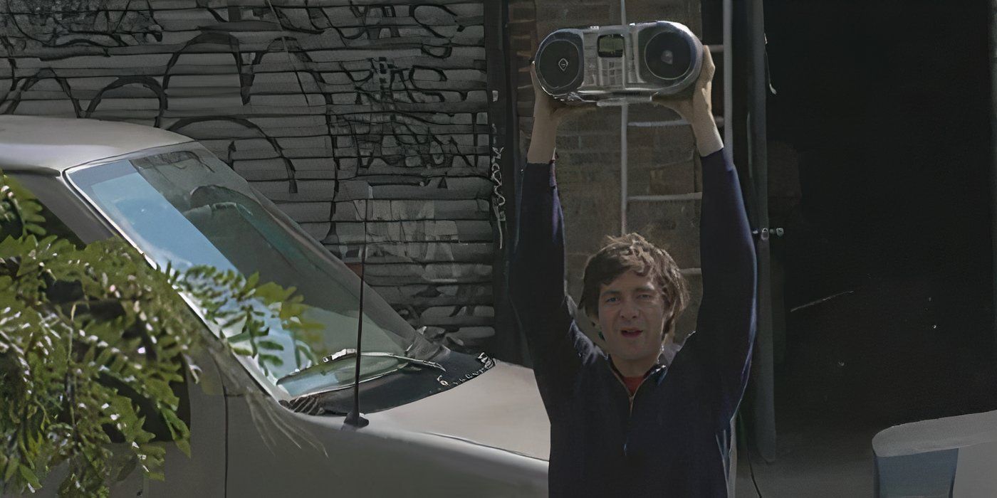 Mark Duplass in The Puffy Chair, holding up a radio