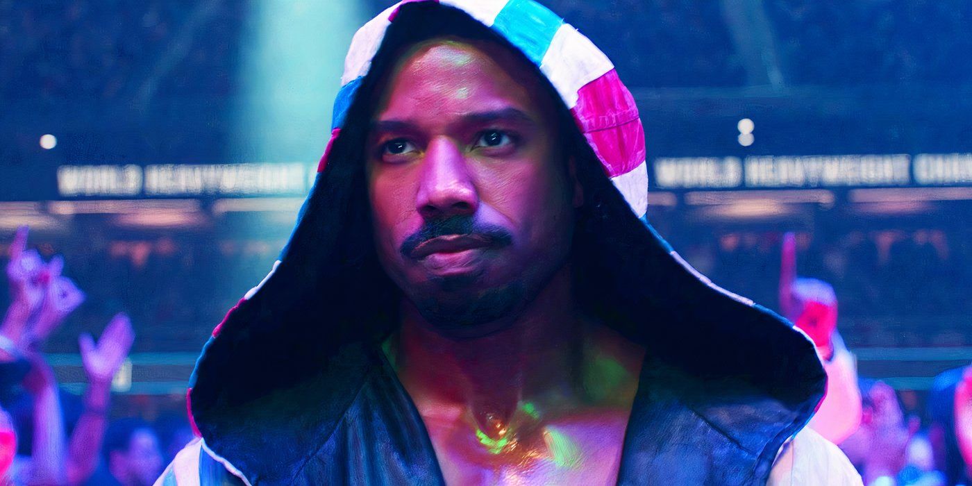 Michael B Jordan as Adonis Creed Wearing a Red White and Blue Hood in Creed III