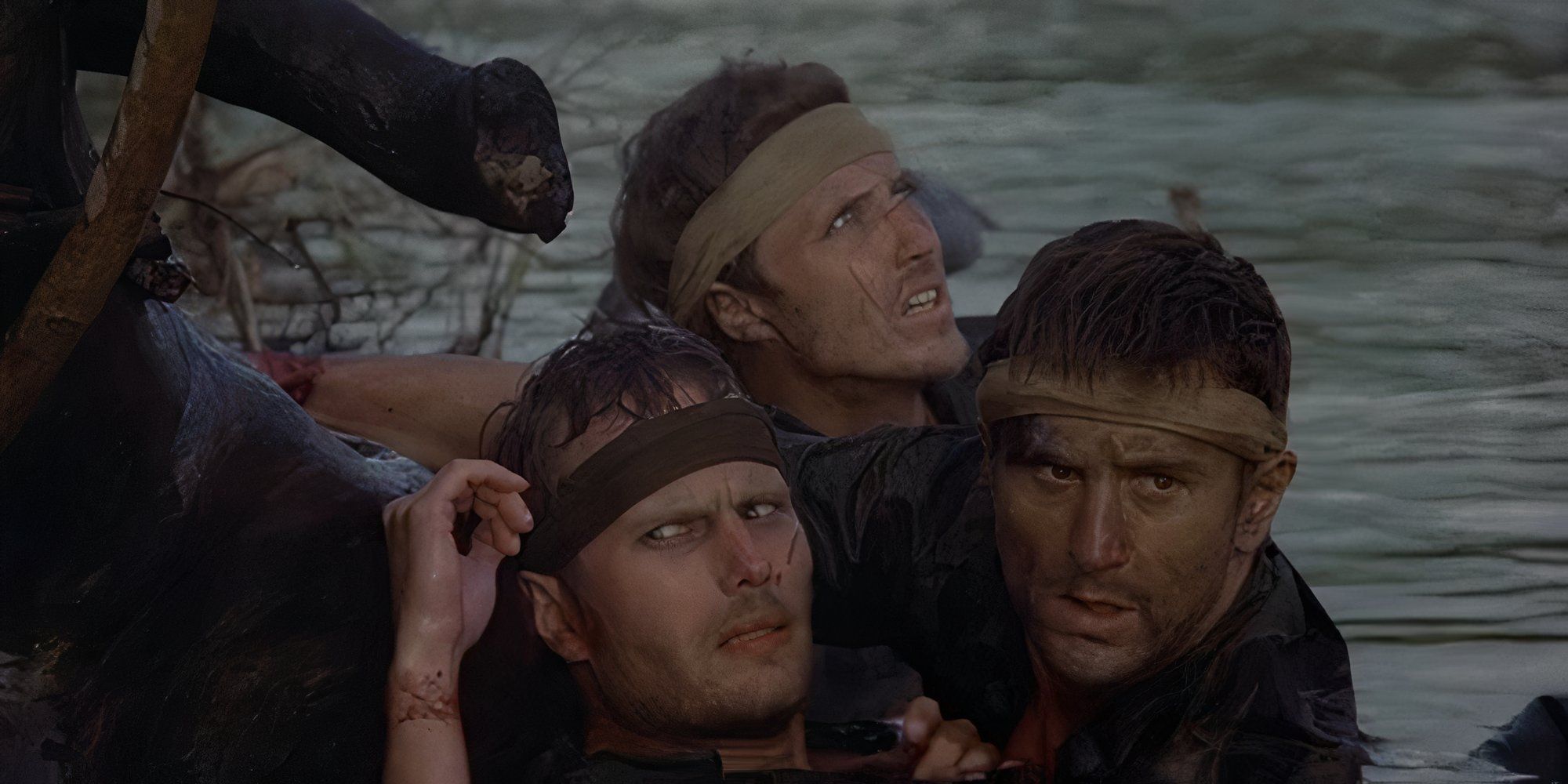 Mike, Steve, and Nick escaping from the Viet Cong in the Deer Hunter