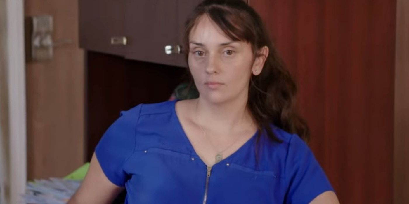 Rayne Hernandez in 90 Day Fiancé in blue shirt with ponytail looking angry