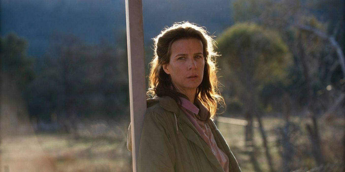 Sally standing outside by a post in Beautiful Kate