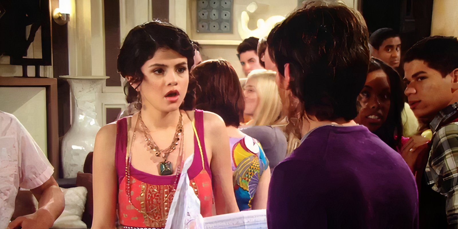 Selena Gomez looking shocked as Alex Russo in front of Gregg Sulkin as Mason Greybeck in Wizards of Waverly Place