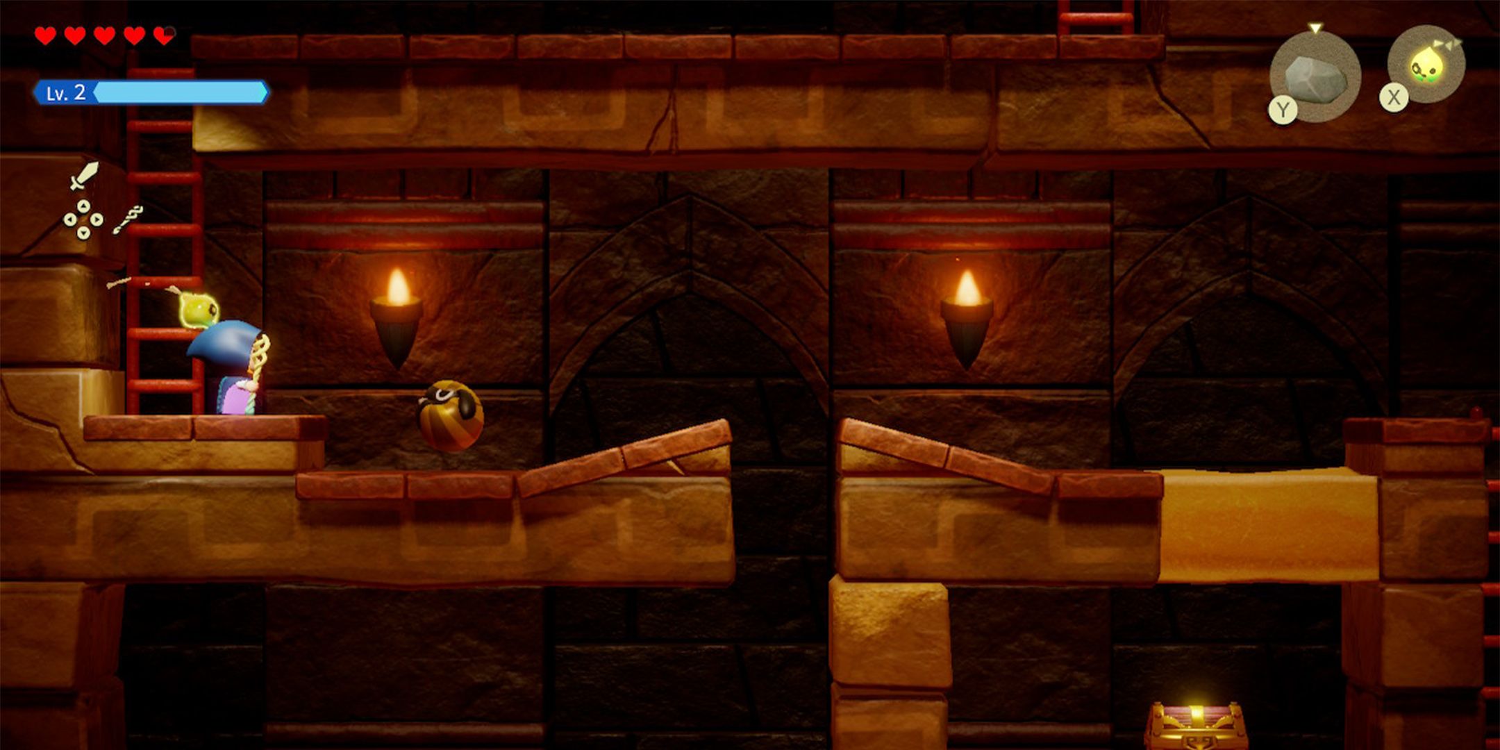 Side-scrolling segment in Zelda Echoes of Wisdom with a chest beneath a layer of sand.