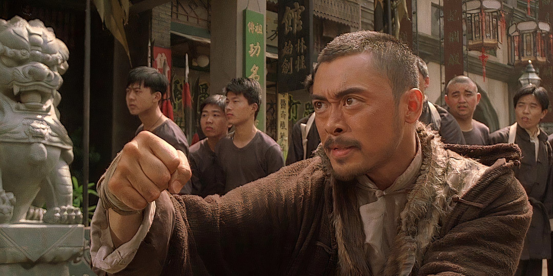 Siu-Wong Fan holds up his fist and is ready to fight. 