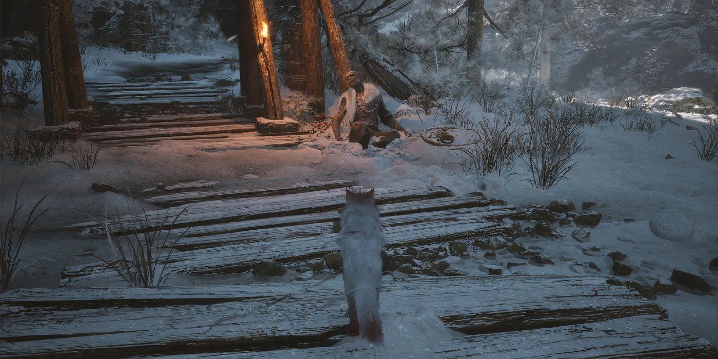 Zorro de nieve parado sobre terreno nevado en negro Mito: Wukong