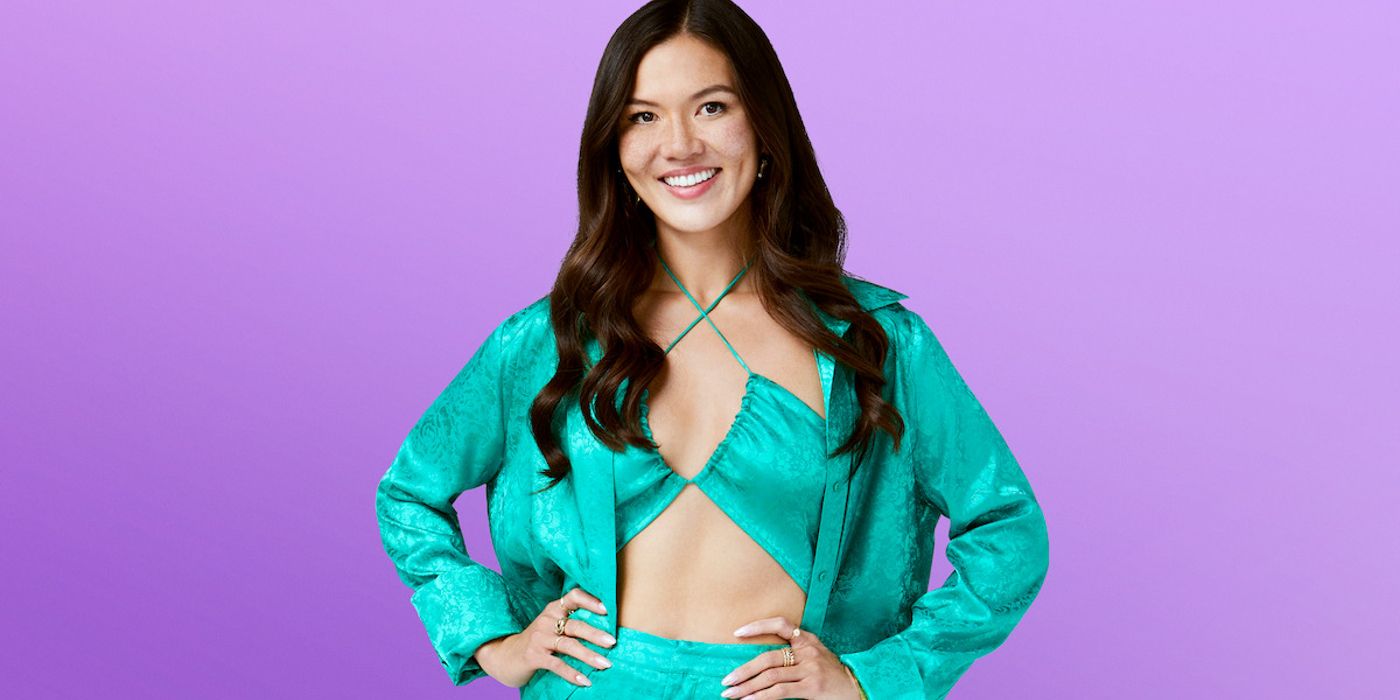 Love Is Blind season 7 Taylor Krause with her hands on her waist while smiling during the promo shot photo