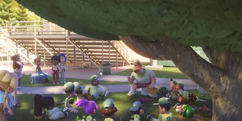 The baseball team from Win or Lose lounges under a tree looking board while the coach speaks