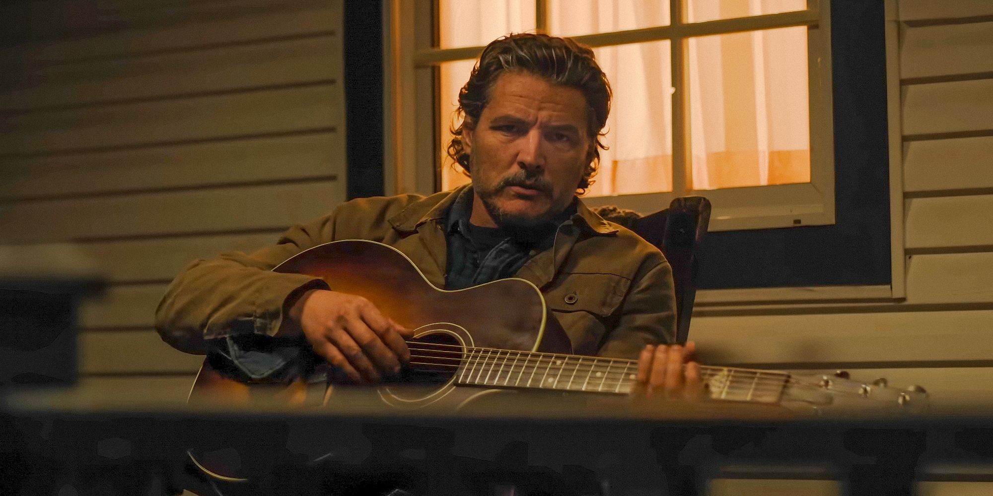 Joel (Pedro Pascal) playing the guitar on the last teaser of the second season of the US