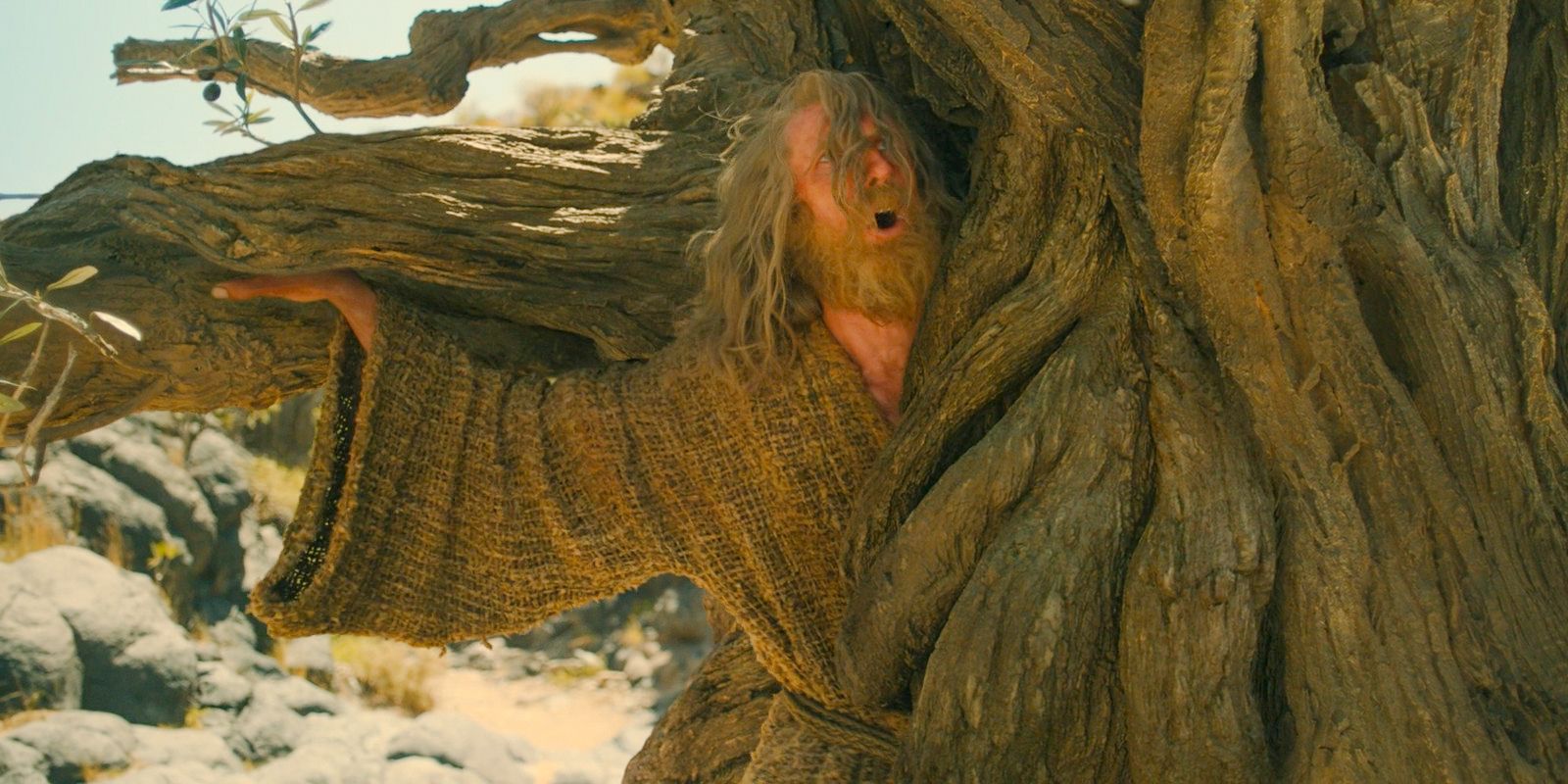 In Rhun, the Stranger (Daniel Weyman) being devoured by Old Man Ironwood in The Lord of the Rings: The Rings of Power Season 2 Episode 4